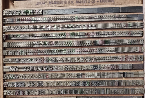 Erbar grotesk leicht punkt - leicht, 24